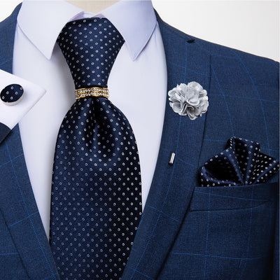 Tamsiai mėlynas kaklaraištis su baltais taškeliais