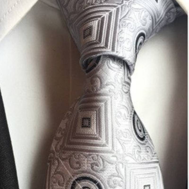 Silver Tie with Square and Circle Patterns