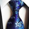 Cravate Bleue à Fleurs Blanches
